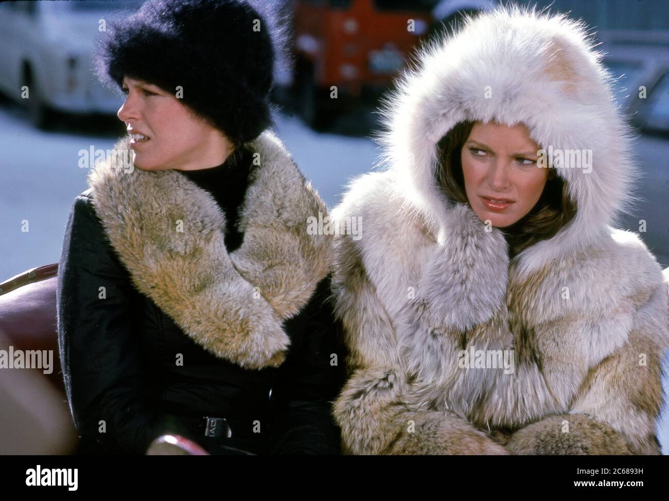 Cheryl Ladd and Jaclyn Smith filming an episode of hit TV show Charlies Angels in Vail, CO circa 1978 Stock Photo