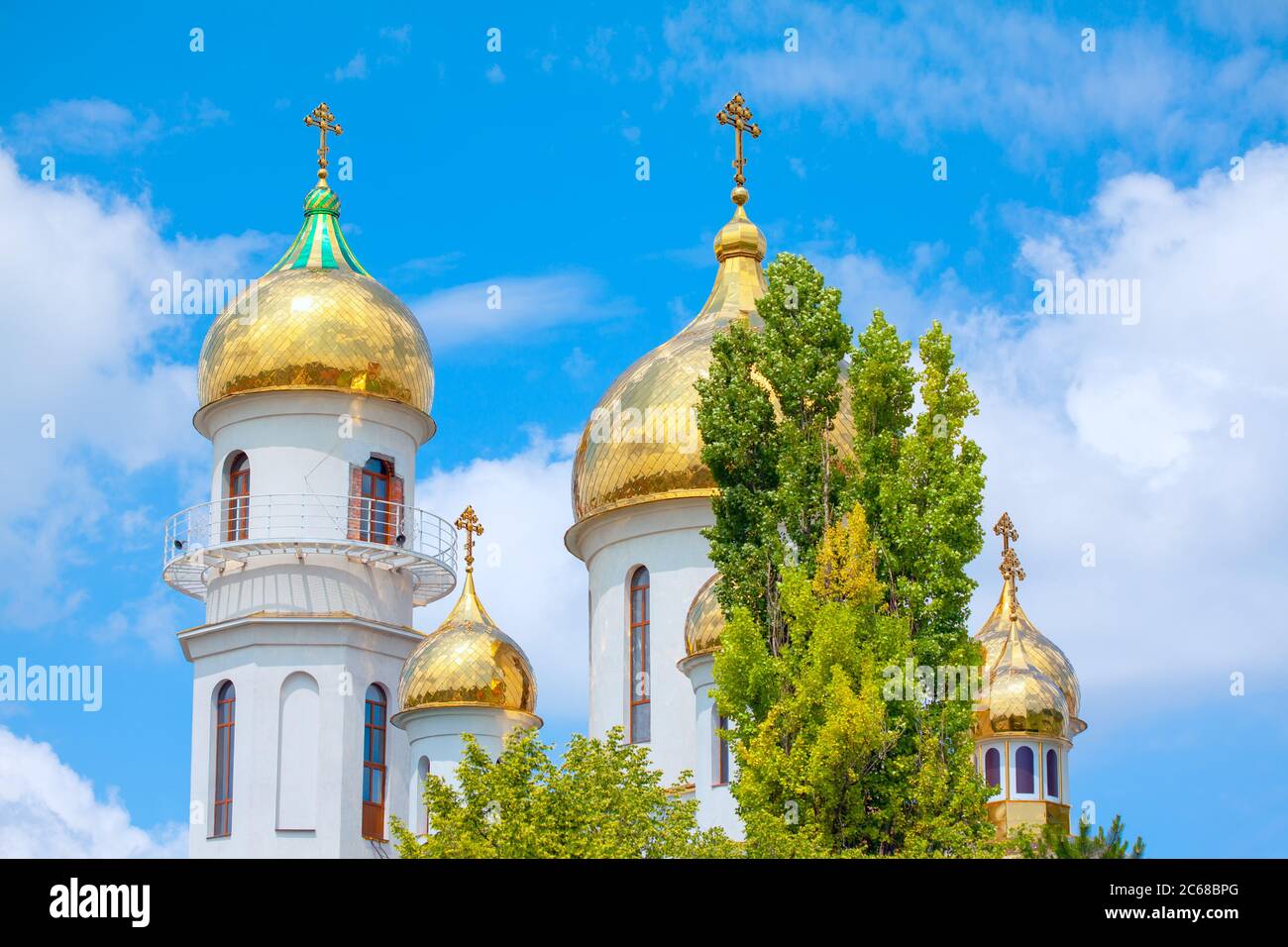 Church with Golden Domes . Religious Cross on the Cupola Top Stock ...