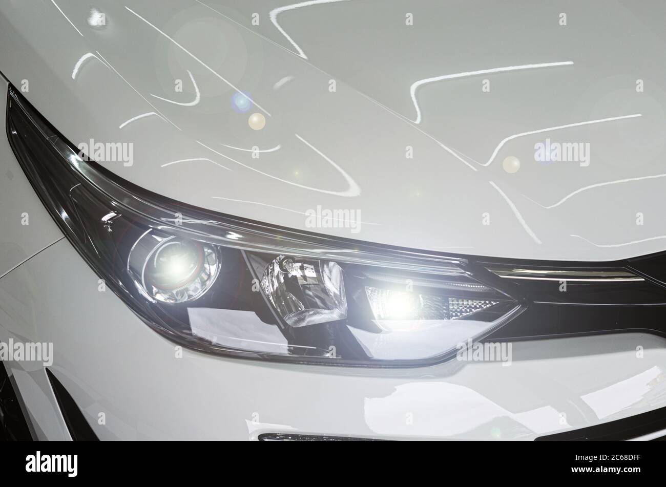 Modern luxury white car headlights Stock Photo Alamy