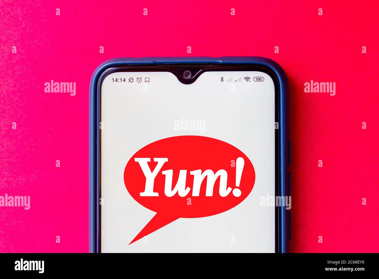 In this photo illustration the Yum! Brands logo seen displayed on a smartphone. Stock Photo
