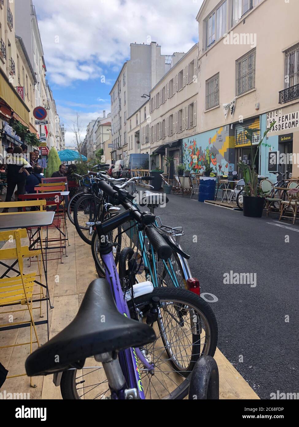 Paris, France. 05th July, 2020. View from the terrace of the restaurant 'Le petit Cambodge' on bicycles and the street Rue Bichat in the 10th arrondissement. Since the Corona pandemic, the whole of Paris is like one open-air café - with XXL terraces. (to dpa going out in Corona times: All of Paris is one terrace) Credit: Julia Naue/dpa/Alamy Live News Stock Photo