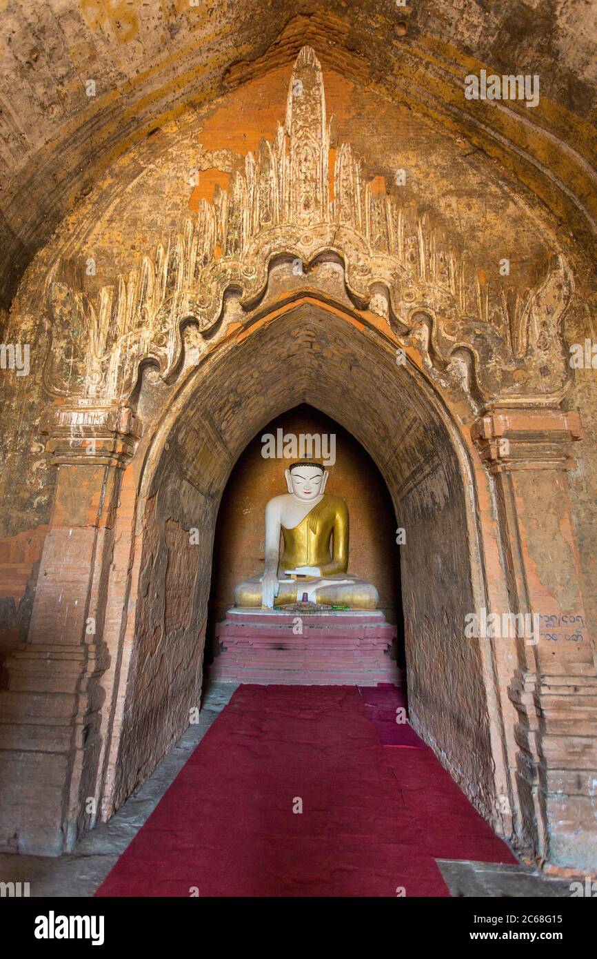 Buddha Statue in the Ananda Temple, Bagan, Myanmar Stock Photo