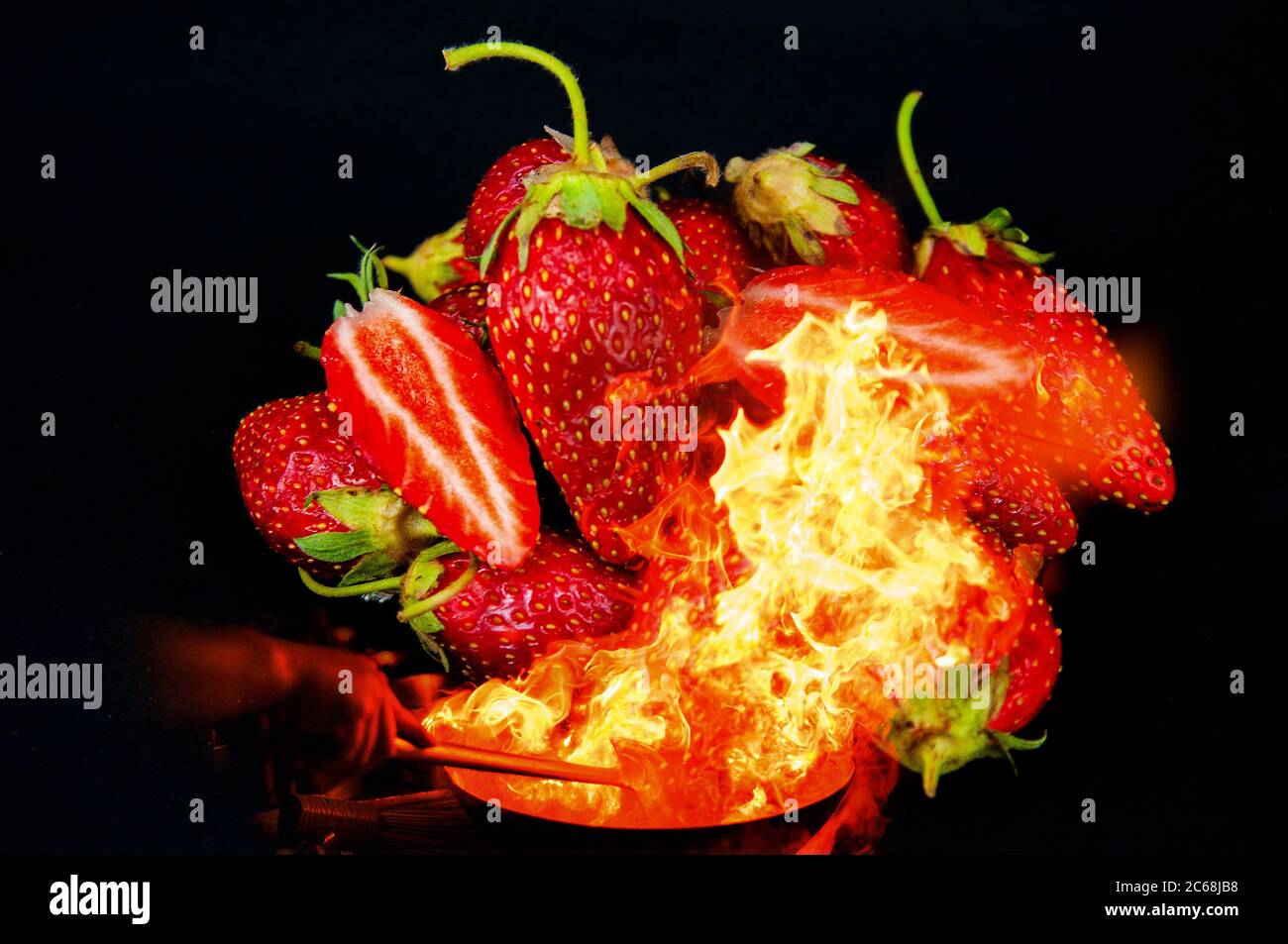 photo double digital exposure with ripe strawberries and fire Stock ...
