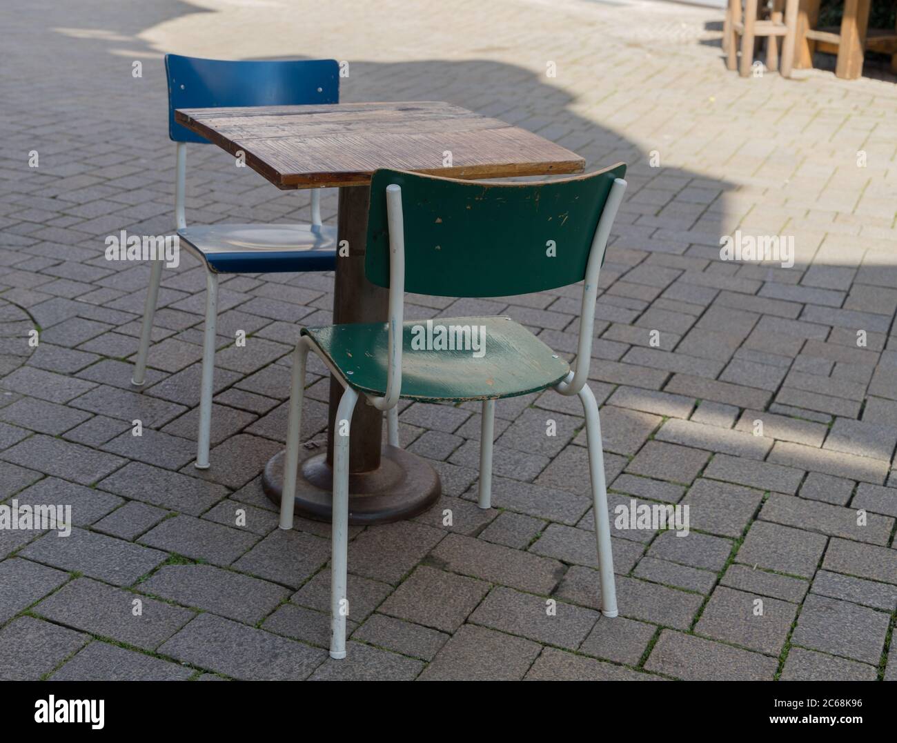 Two wooden chairs table hi-res stock photography and images - Alamy