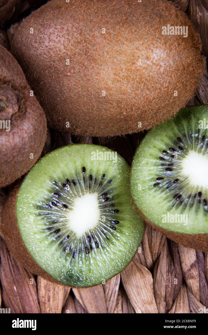 Some kiwi fruits in a basket. Kiwis are a rich source of vitamin C