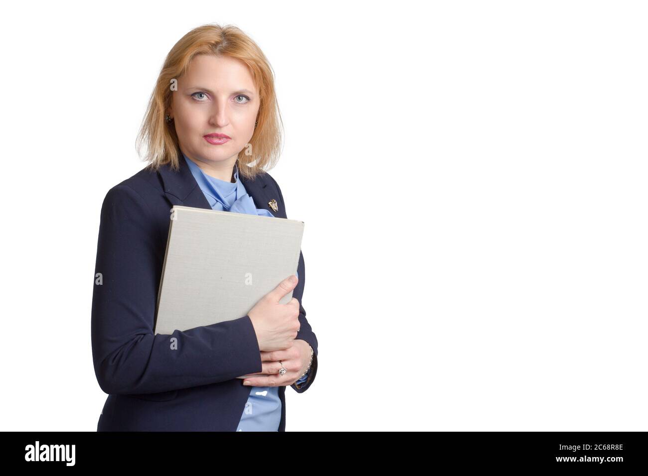 plus size caucasian business office woman. isolated in white. holding a folder with documents or a book Stock Photo