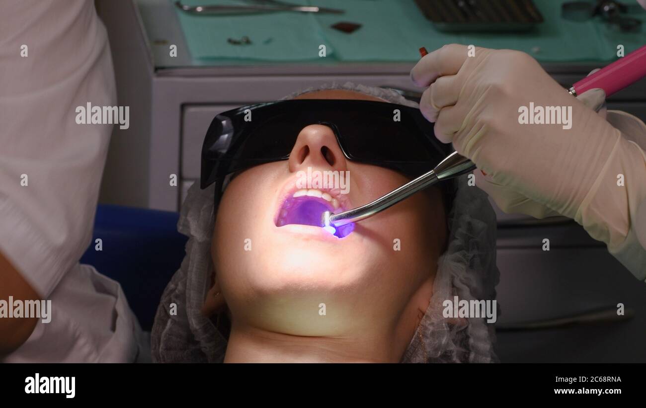 Young woman at dental clinic Stock Photo
