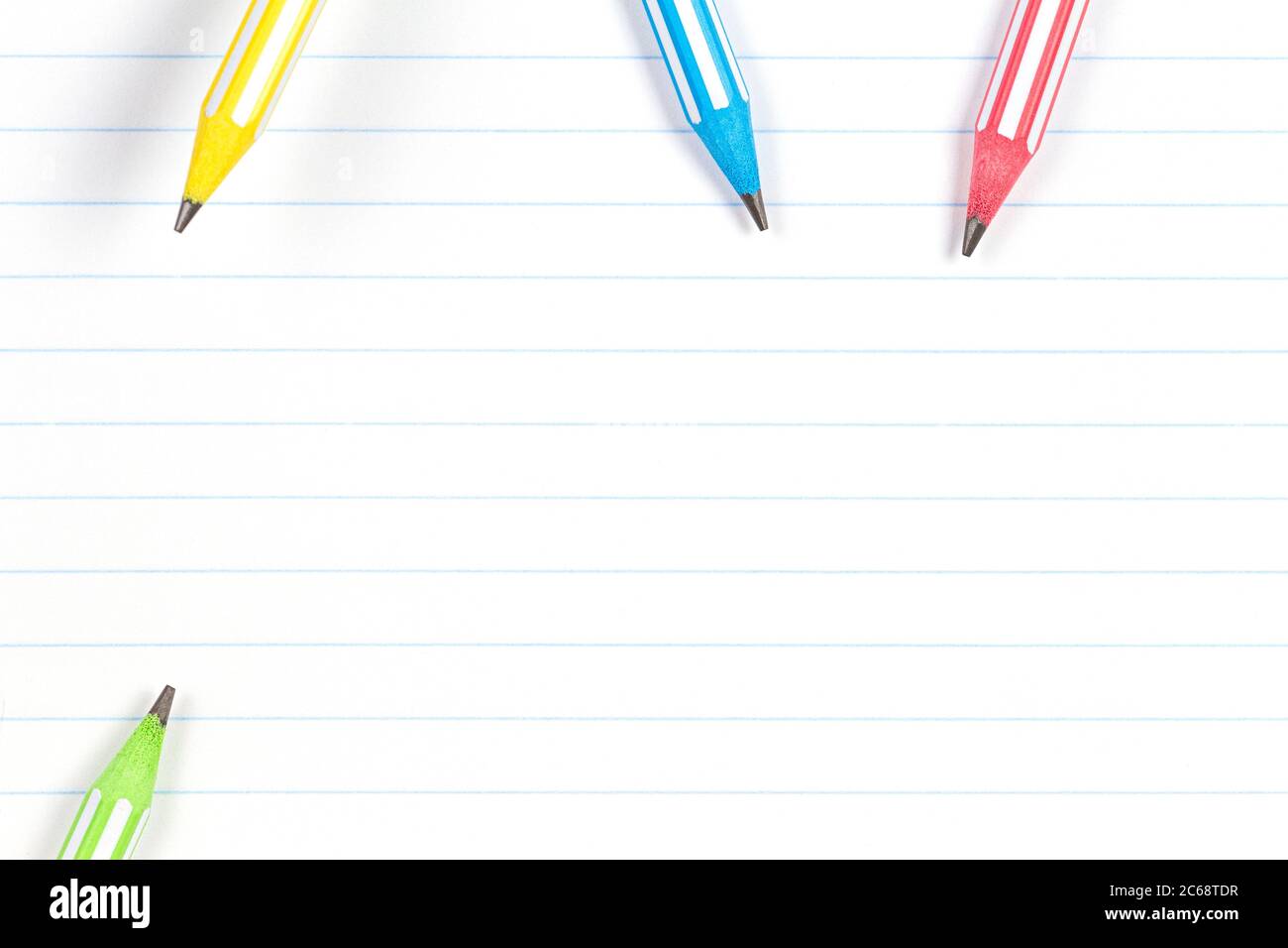 Colorful pencils on notebook lined paper background with copy space. Back  to school, education, learning concept Stock Photo - Alamy