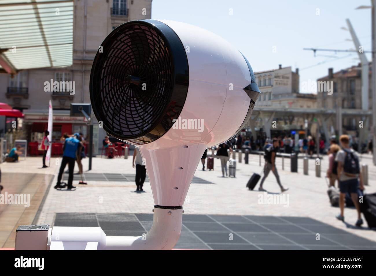 large white air fan on city street in summer day in Bordeaux town France Stock Photo