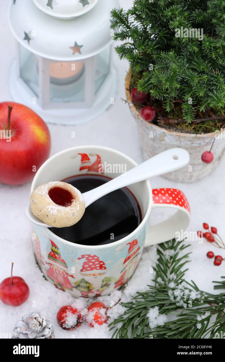 christmas decoration with mulled wine in cup and christmas biscuit Stock Photo