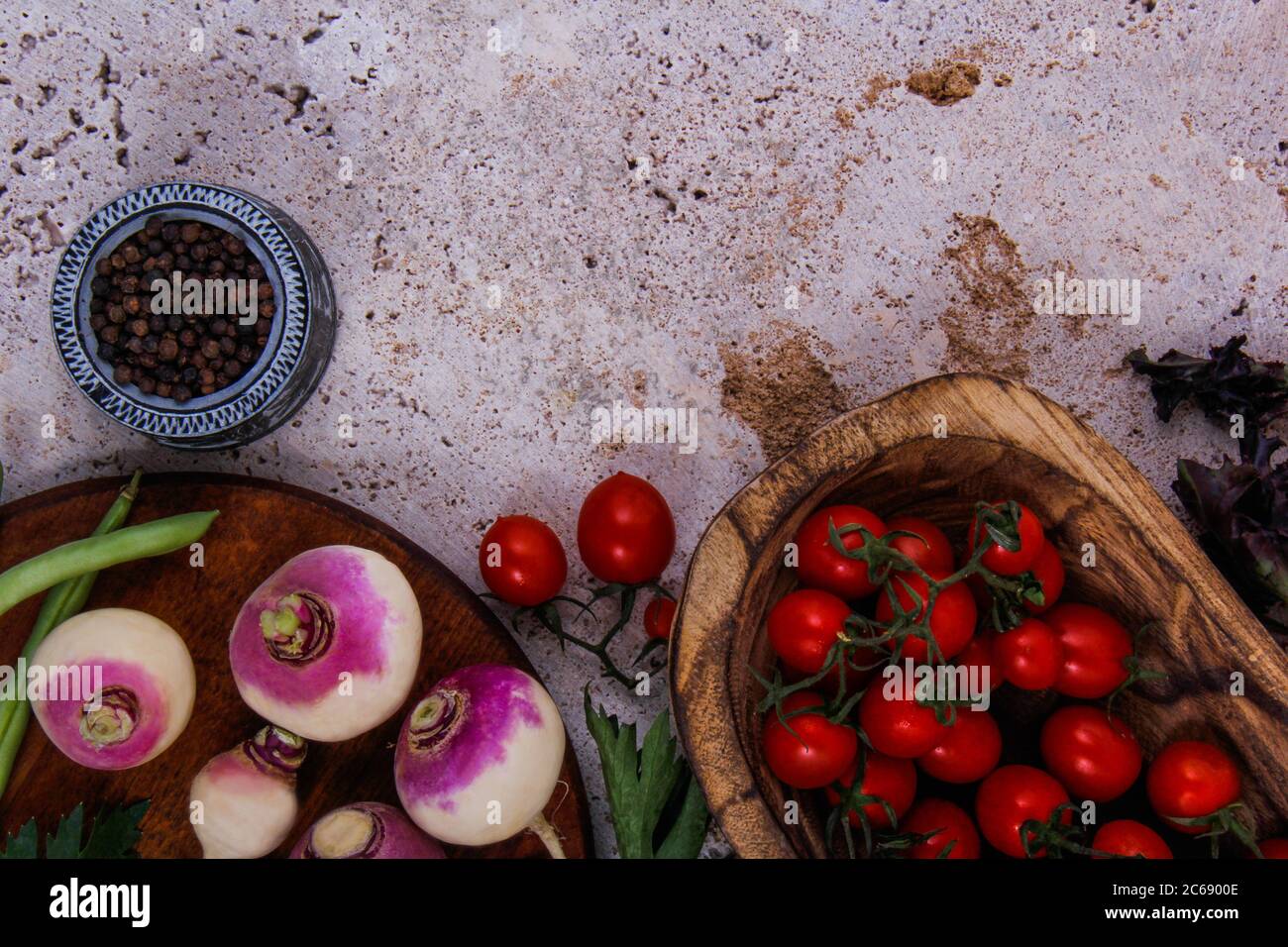 Tomatoes, turnips, parsley and black pepper. Stock Photo