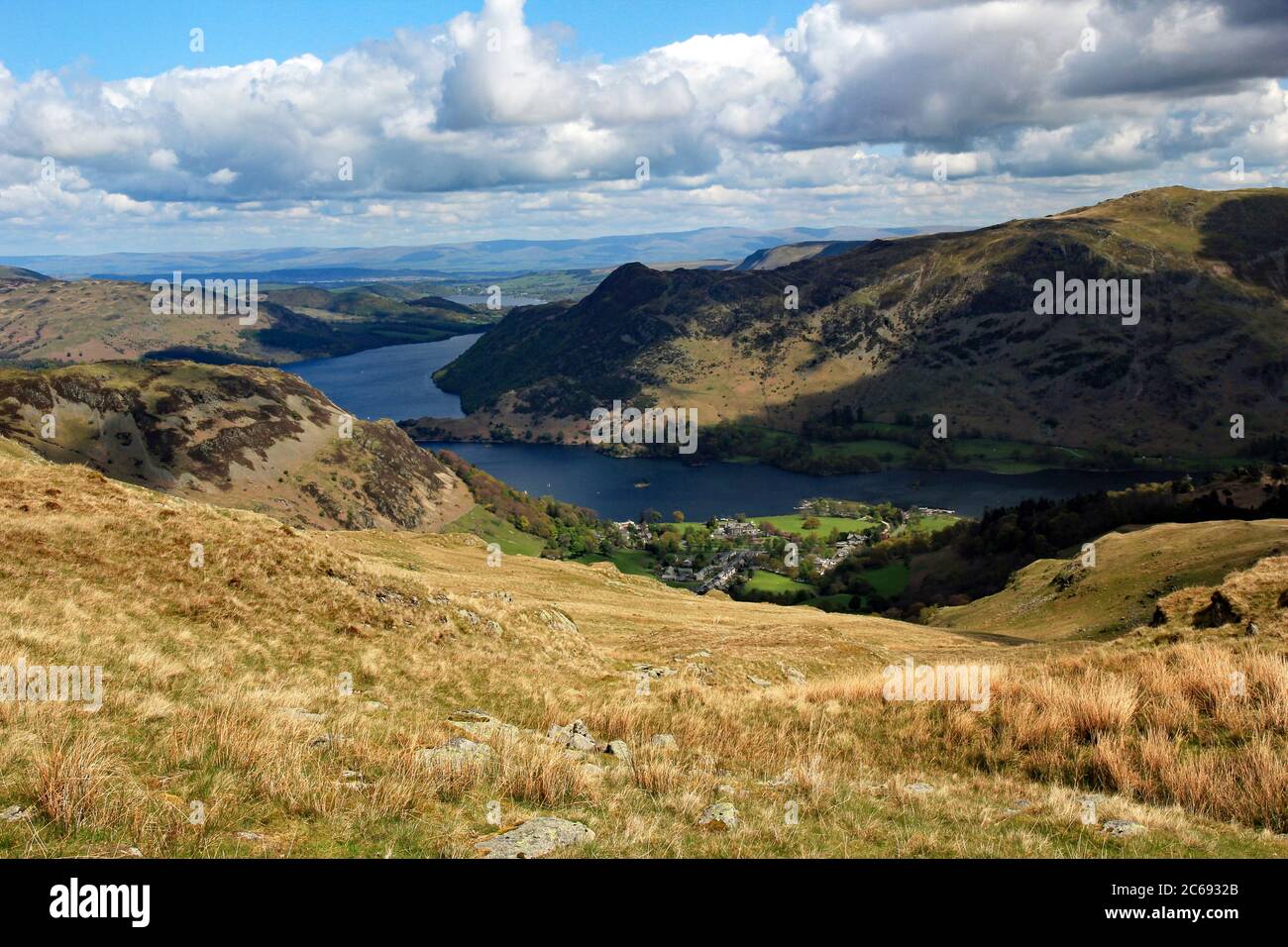 Clear Spring Day view of the pastoral countryside, fells, and farmland surrounding Glenridding and Ullswater in the Lake District, England Stock Photo