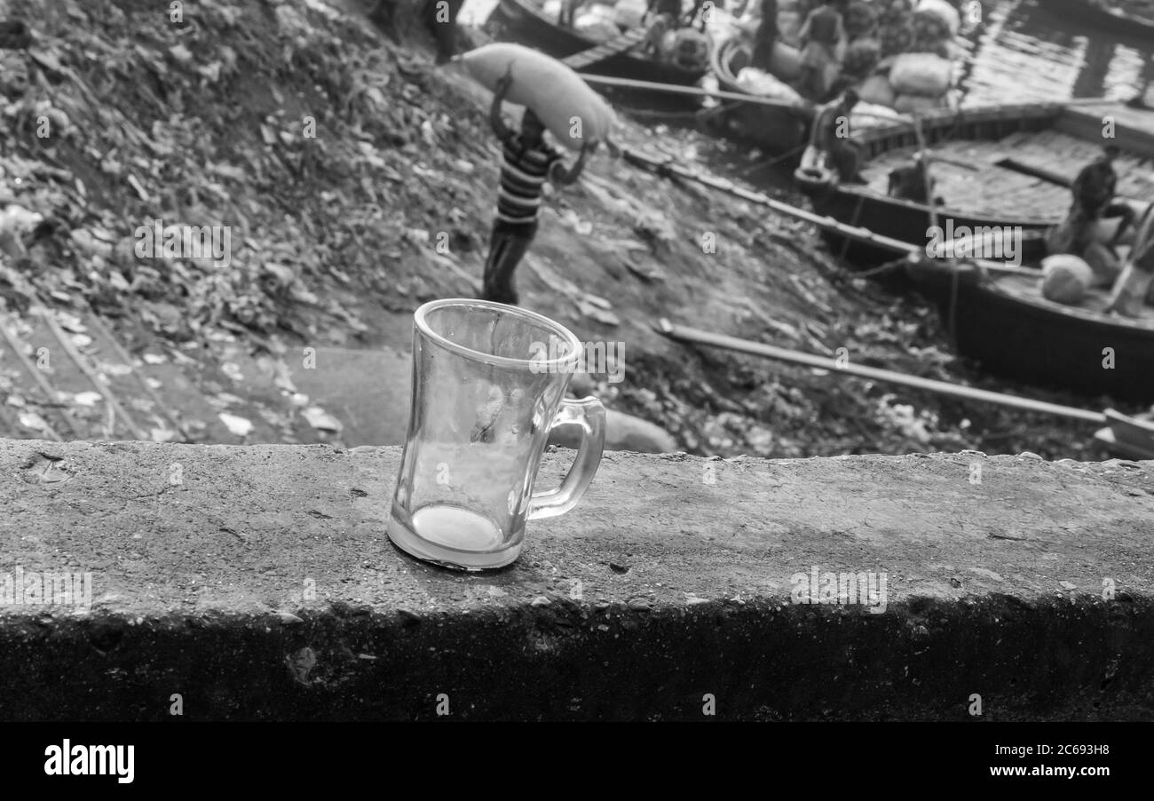 I captured this image from a boat station besides Burigonga river where different type of foods come from village, here a man carrying heavy sack for Stock Photo