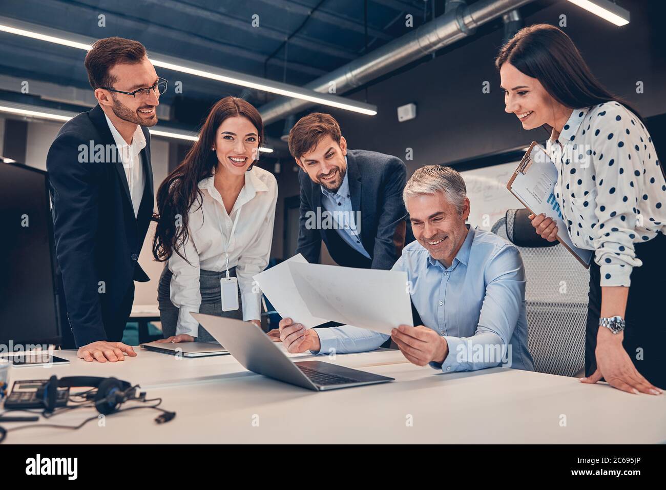 Business people developing strategy in modern office Stock Photo