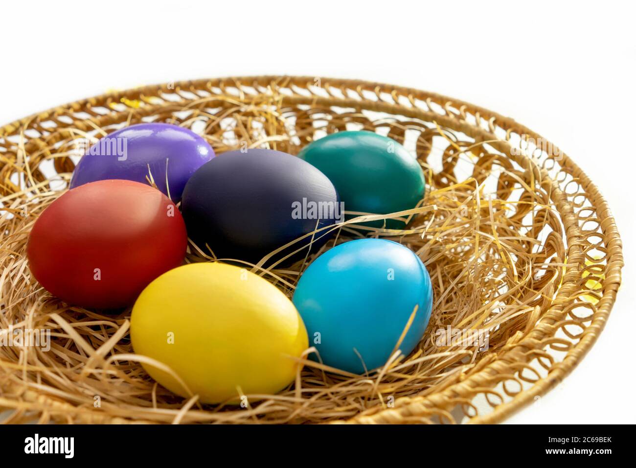 Multi-colored easter paint eggs in pottle close up. Festive easter concept. Stock Photo