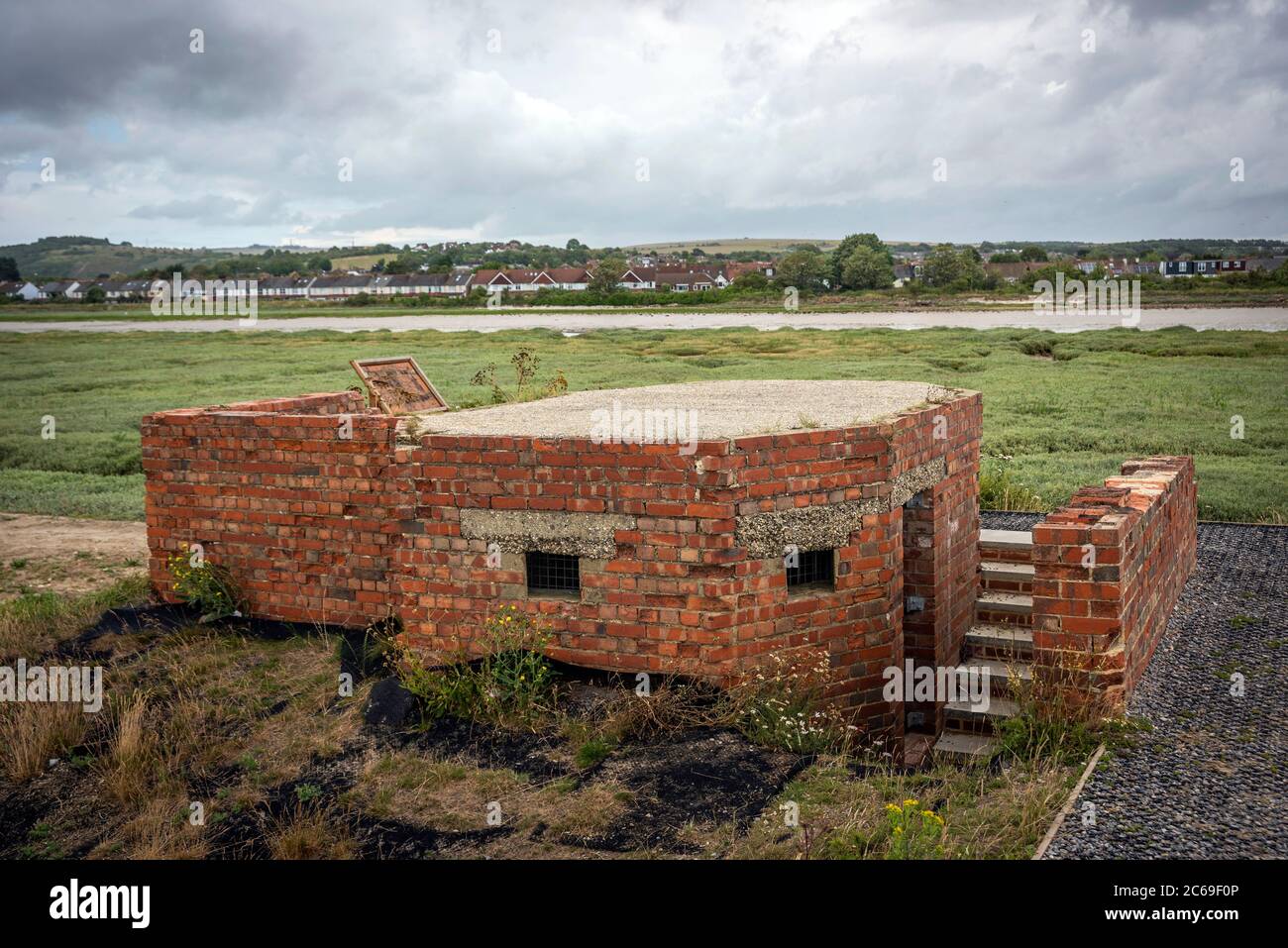 World War Two gun emplacement overlooking the River Adur near Shoreham Airport, West Sussex, UK Stock Photo