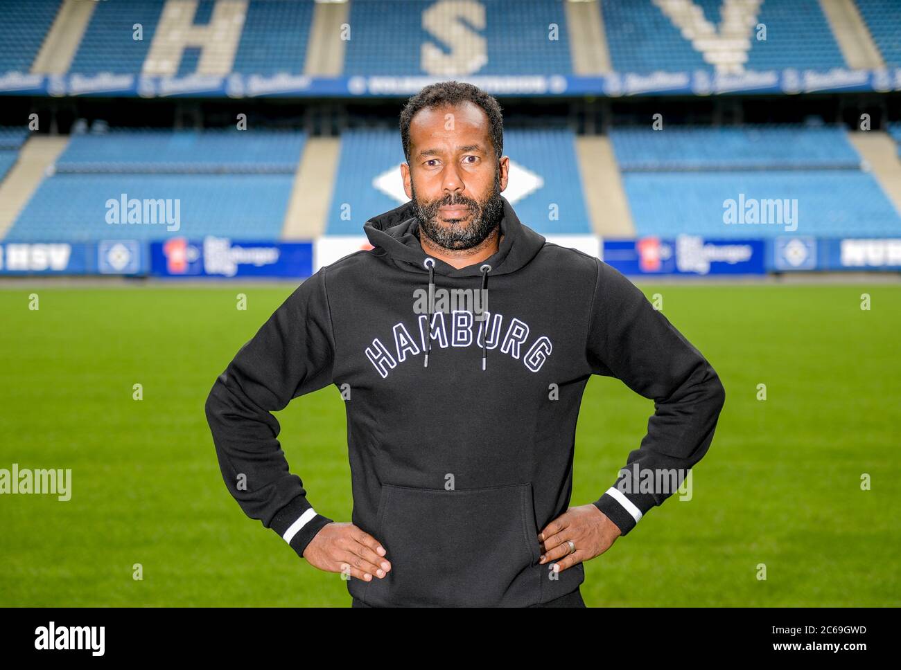 Hamburg, Germany. 08th July, 2020. Daniel Thioune, the new coach of Hamburger  SV, is standing on the grass of the Volksparkstadion. Credit: Axel  Heimken/dpa - IMPORTANT NOTE: In accordance with the regulations