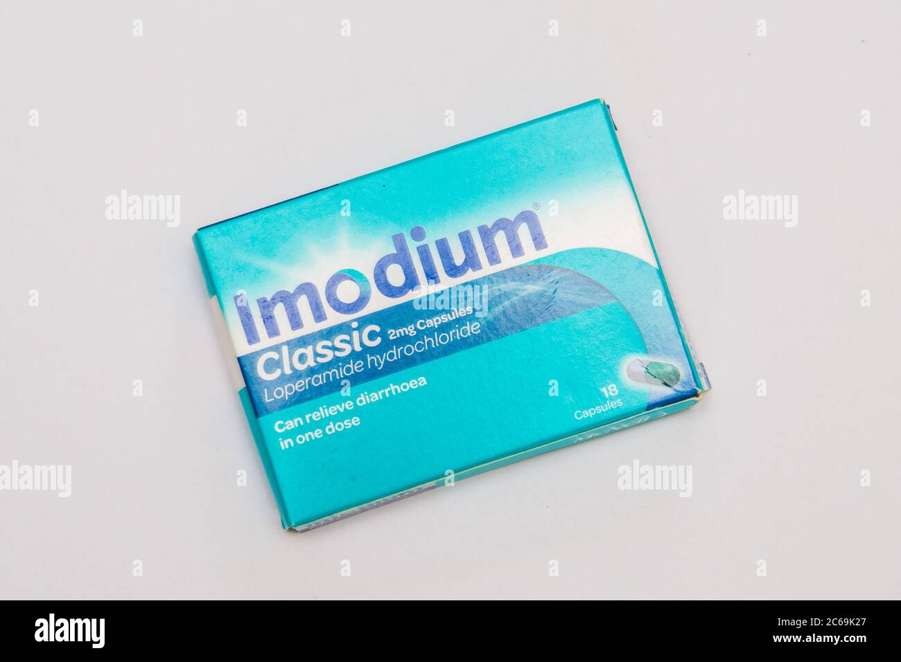 A package of Imodium medicine for heartburn, gas and bloating on an isolated background Stock Photo