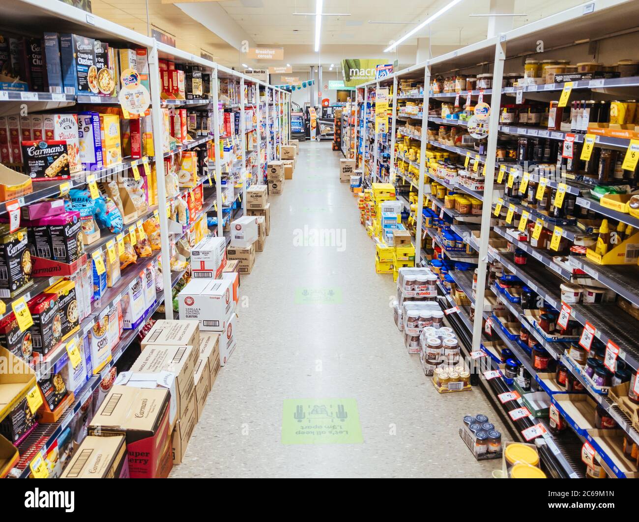 Empty Food and Product Shelves at an Australian Supermarket Stock Photo