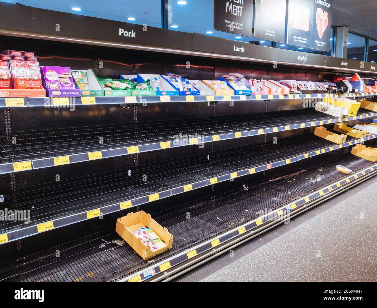 Empty Food and Product Shelves at an Australian Supermarket Stock Photo