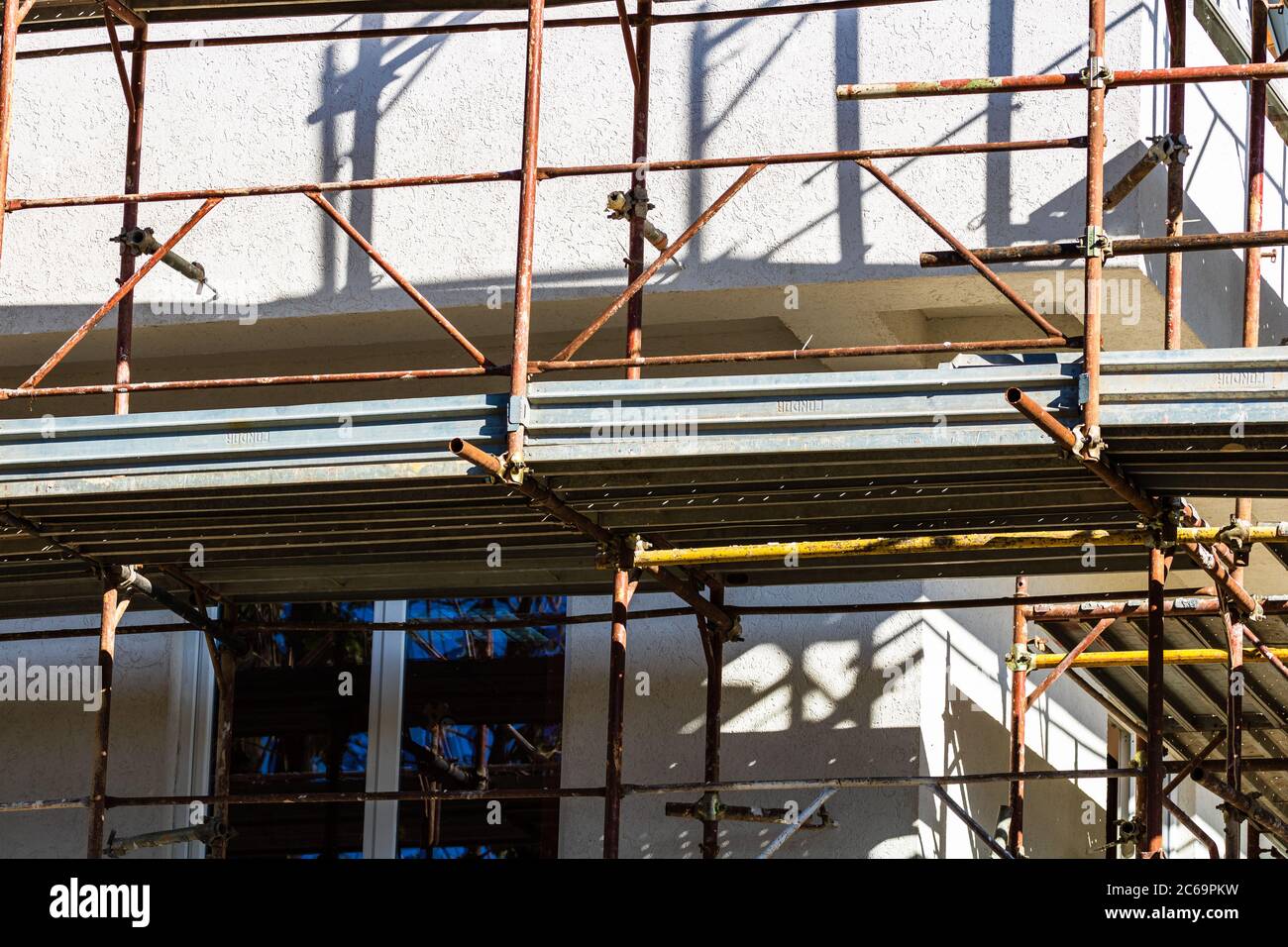 New construction, steel scaffold. House under construction Stock Photo