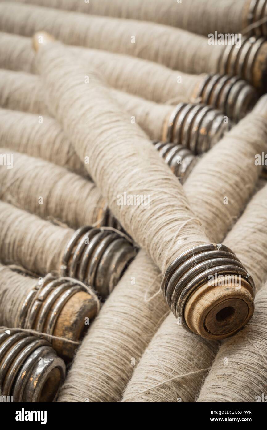 spools with thread for using in a loom Stock Photo