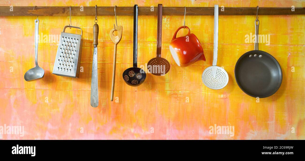vintage hanging kitchen utensils cooking,kitchen, food concept Stock ...
