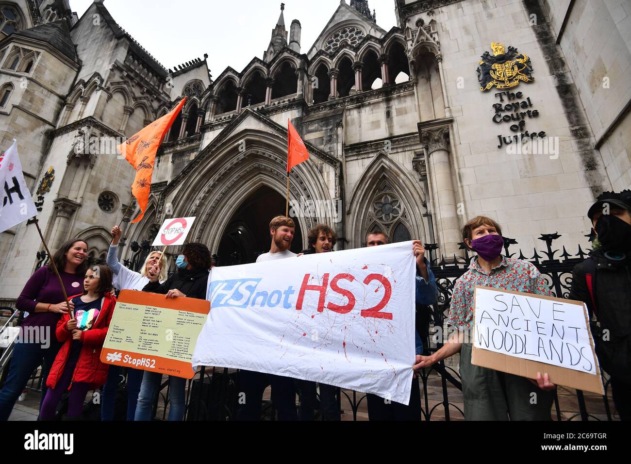 Protestors outside the Court of Appeal, London, where TV presenter Chris Packham is appealing the High Court decision which refused him permission to bring a claim against the Government's decision to give the green light to HS2. Stock Photo