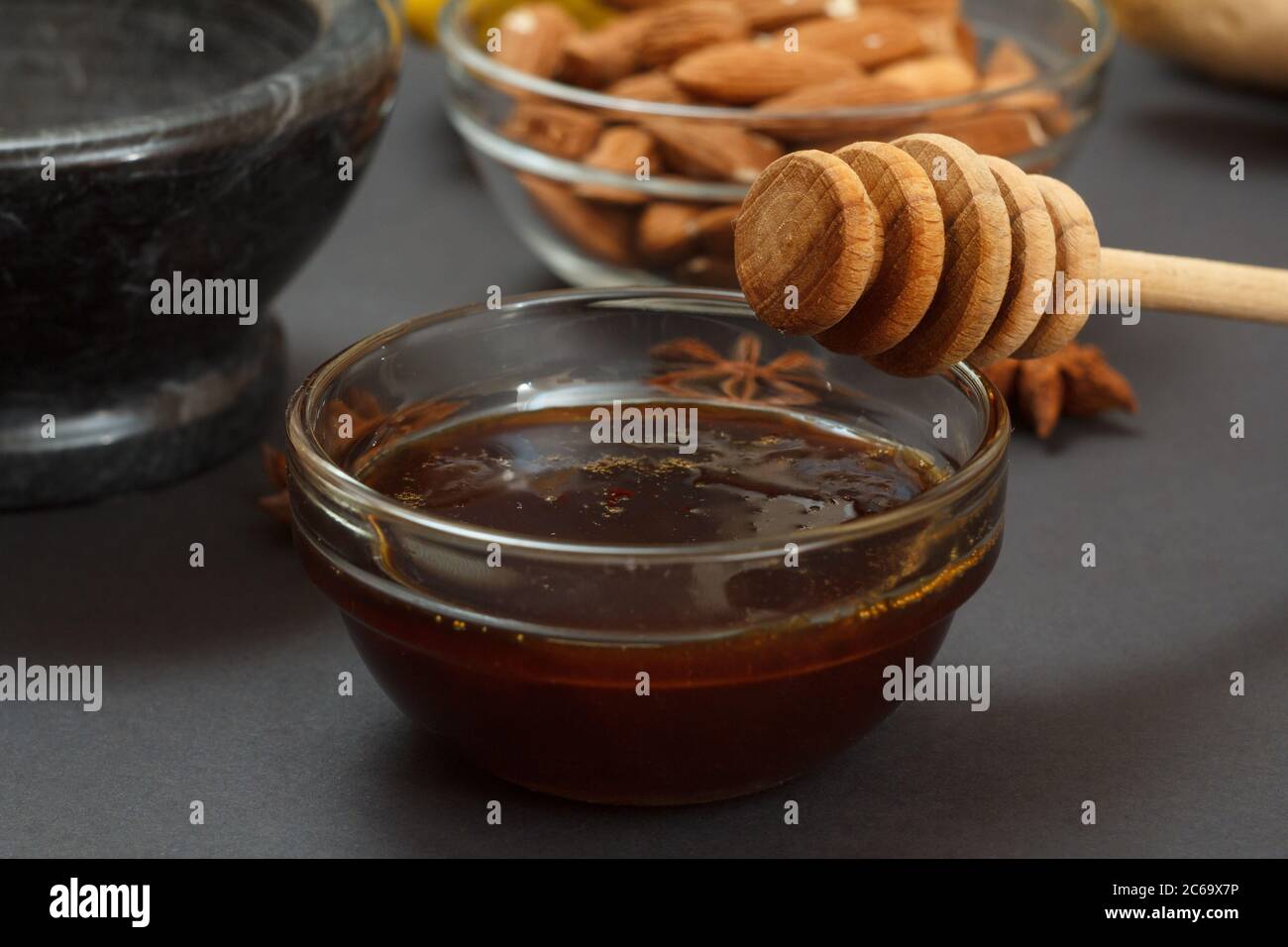 Health remedy foods for cold and flu relief with honey, nuts and a star