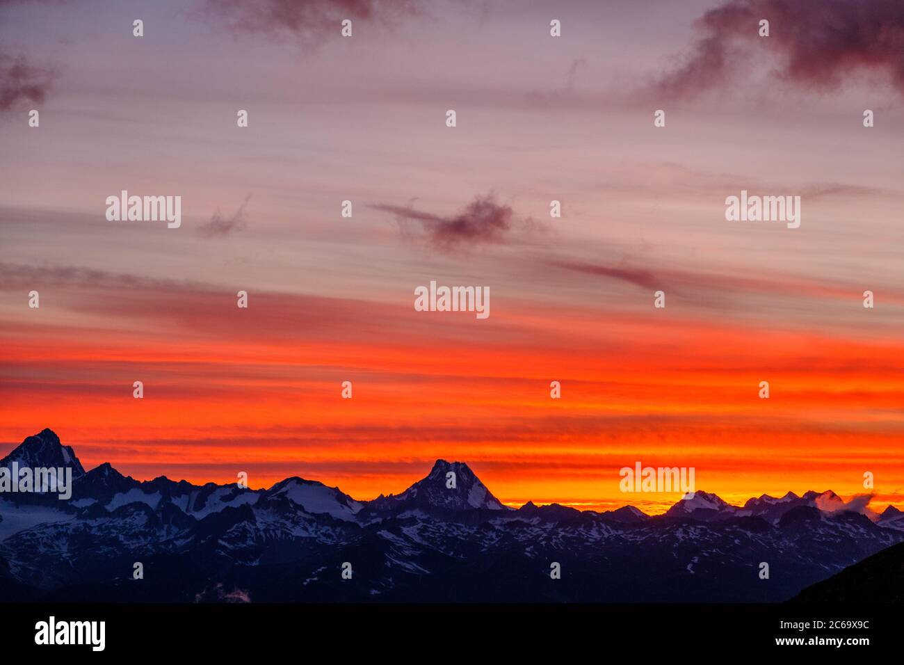 Sunset on the Bernese Alps, view from Nufenen Pass, Switzerland Stock Photo