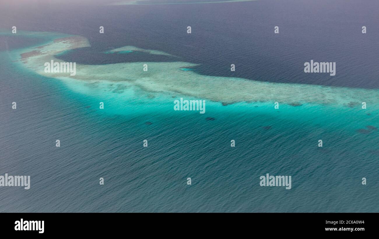 Coral sea from aerial view. Tropical sea ocean pattern, exotic seascape Stock Photo