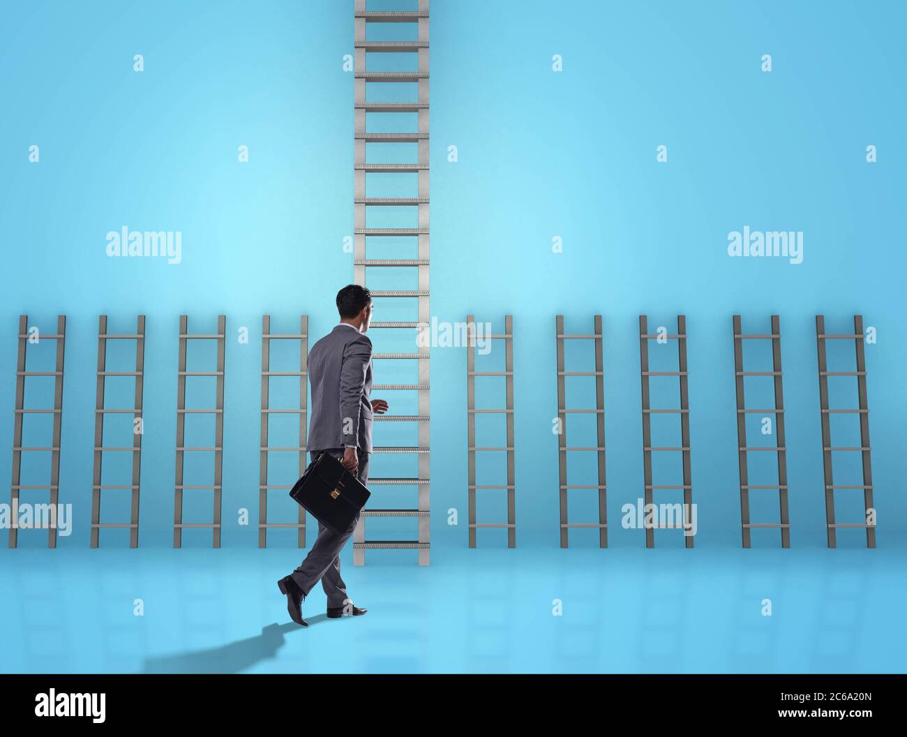The businessman climbing career ladder in business success concept ...