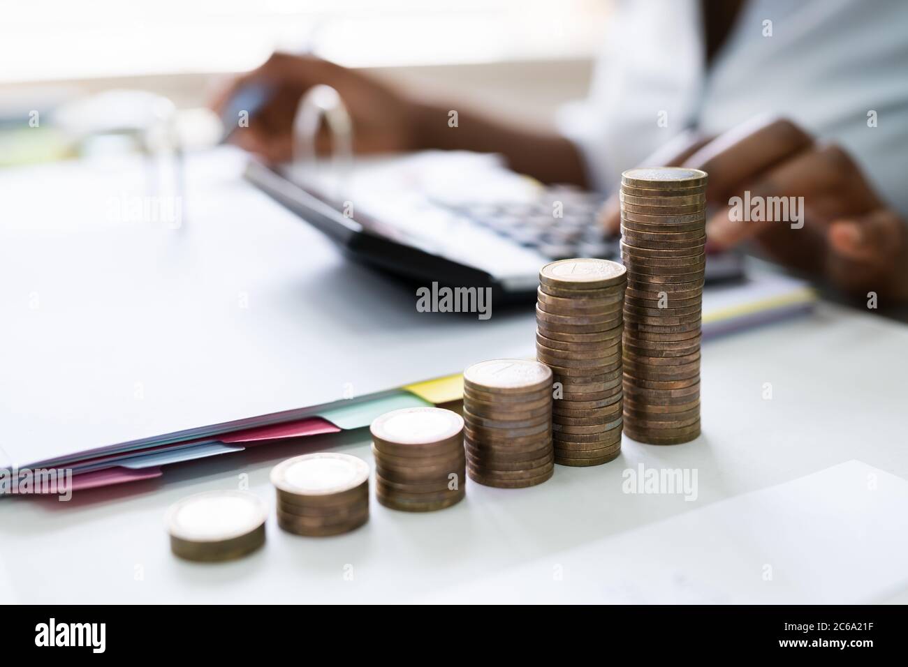 African American Tax Payment And Inflation Calculator Stock Photo