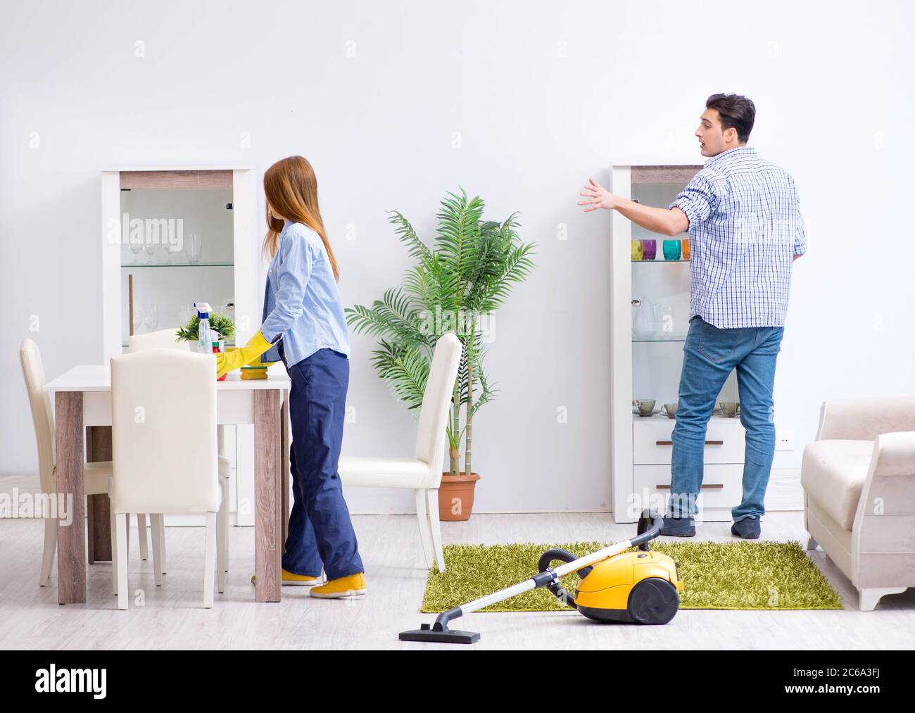 The young family cleaning the house Stock Photo Alamy