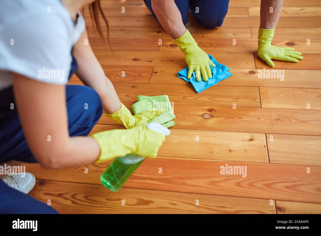 regular clean up. Cleaning people, janitors washing floor with rags and