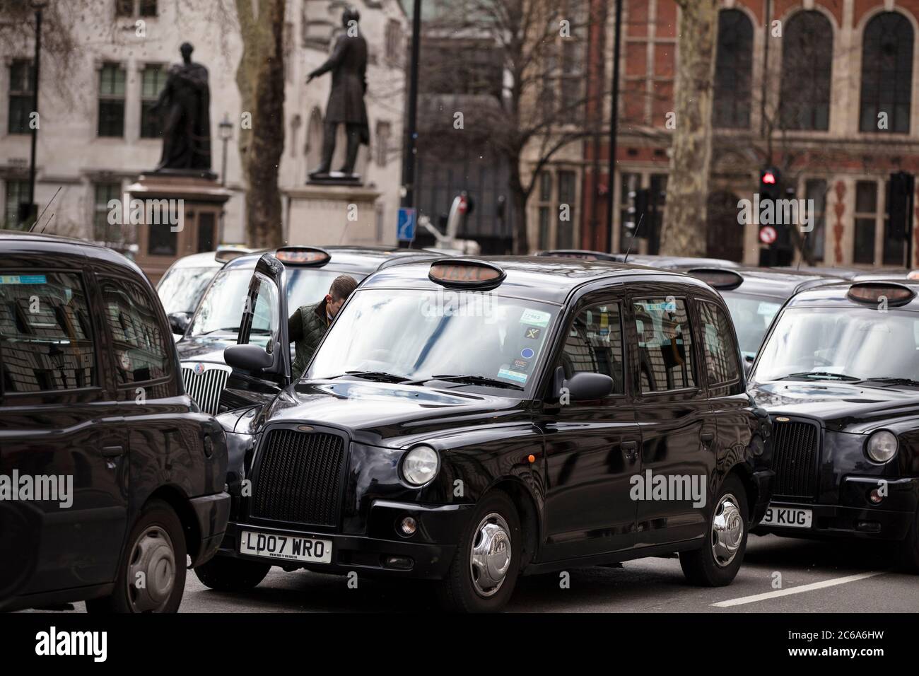 Taxis block roads in Westminster in protest  Stock Photo