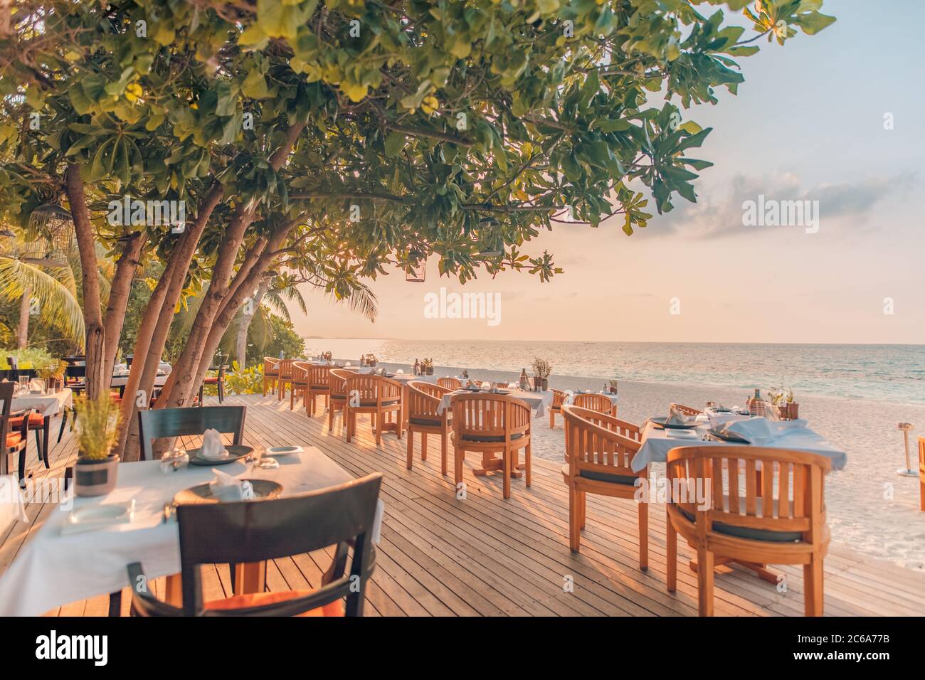 Outdoor restaurant at the beach. Table setting at tropical beach restaurant Stock Photo Alamy
