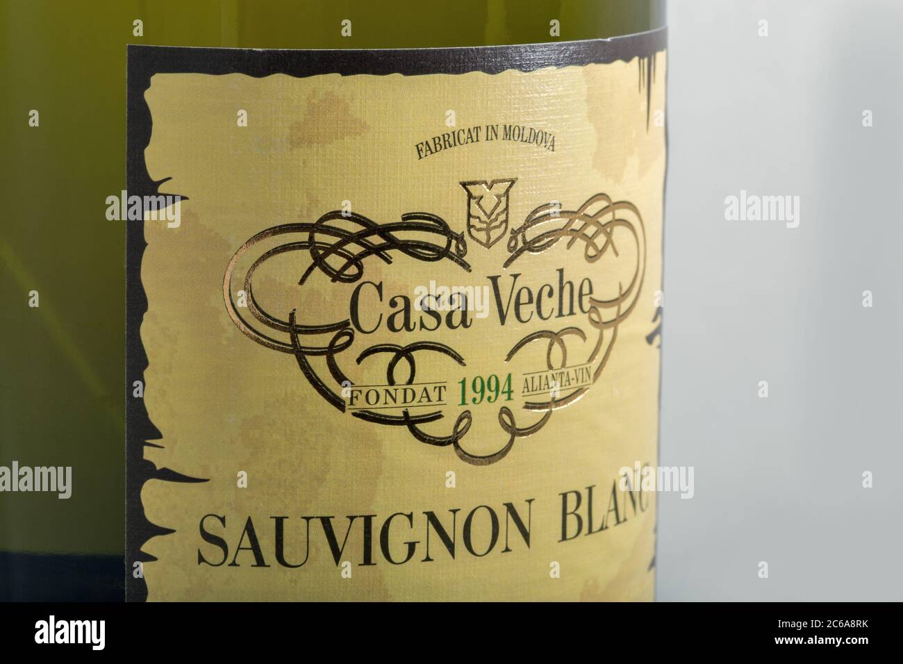 KYIV, UKRAINE - MAY 15, 2020: Cabernet Sauvignon Blanc wine bottle label from Casa Veche Moldavian winery closeup against white. Stock Photo