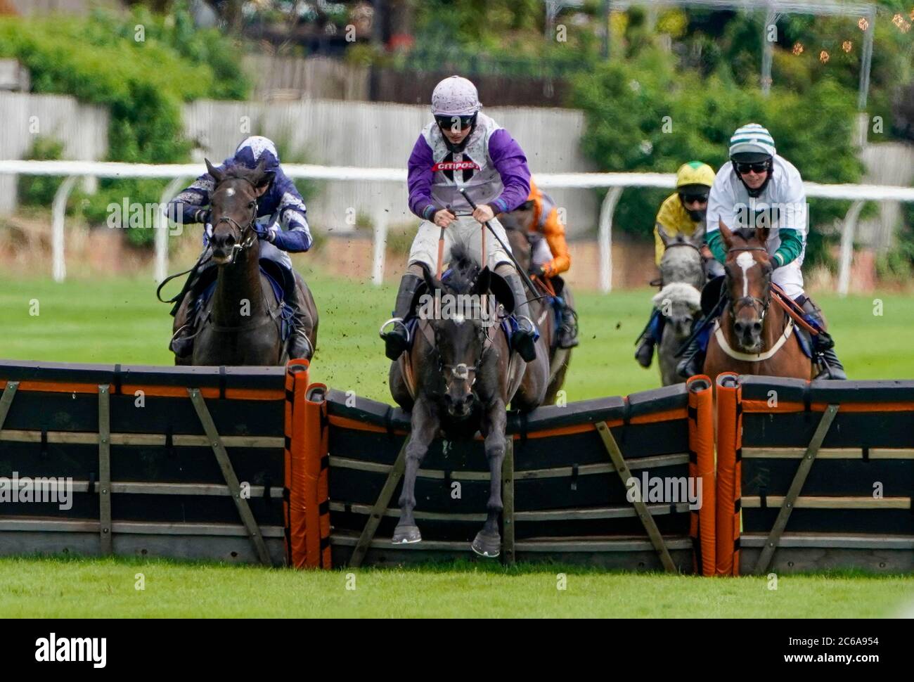 Sean Bowen riding Pogo I Am (centre) clear the last to win The Irish Thoroughbred Marketing Mares' Novices' Hurdle at Stratford-on-Avon Racecourse. Stock Photo