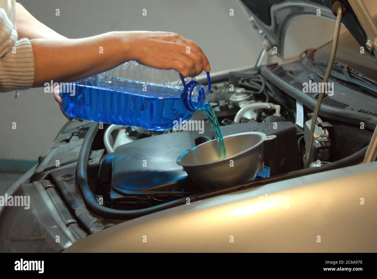 Filling the windshield washer fluid on a Car Stock Photo Alamy