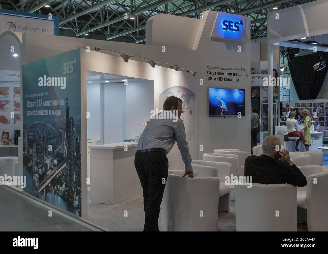 KYIV, UKRAINE - MAY 21, 2015: SES, satellite and terrestrial telecommunications network provider booth on TV and Radio International Fair in ACCO EC, Stock Photo