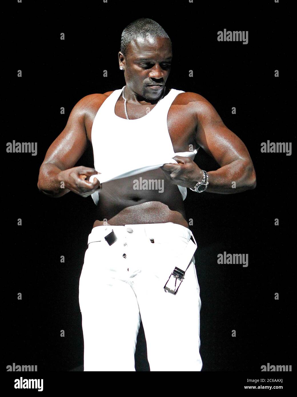 R & B male vocalist Akon strips down to his briefs while performing on stage at the BankAtlantic Center in Sunrise, Florida. Stock Photo