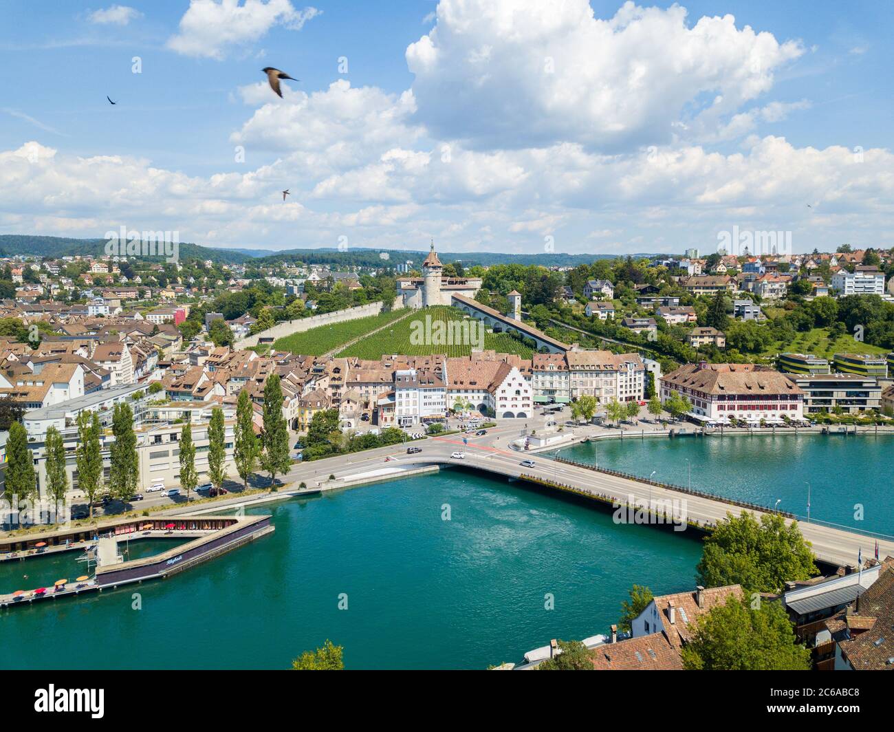 Schaffhausen, Switzerland - 14 July 2018: Aerial view of the Swiss old town Schaffhausen, with the medival castle Munot over the Rhine river. Munot is Stock Photo