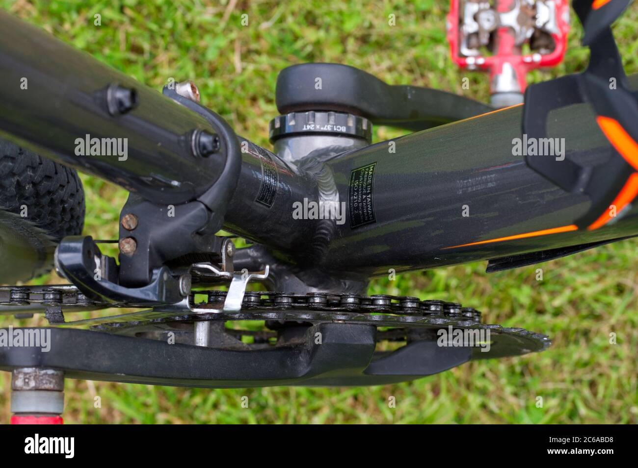 Cranks and chain on pedal bike Stock Photo Alamy