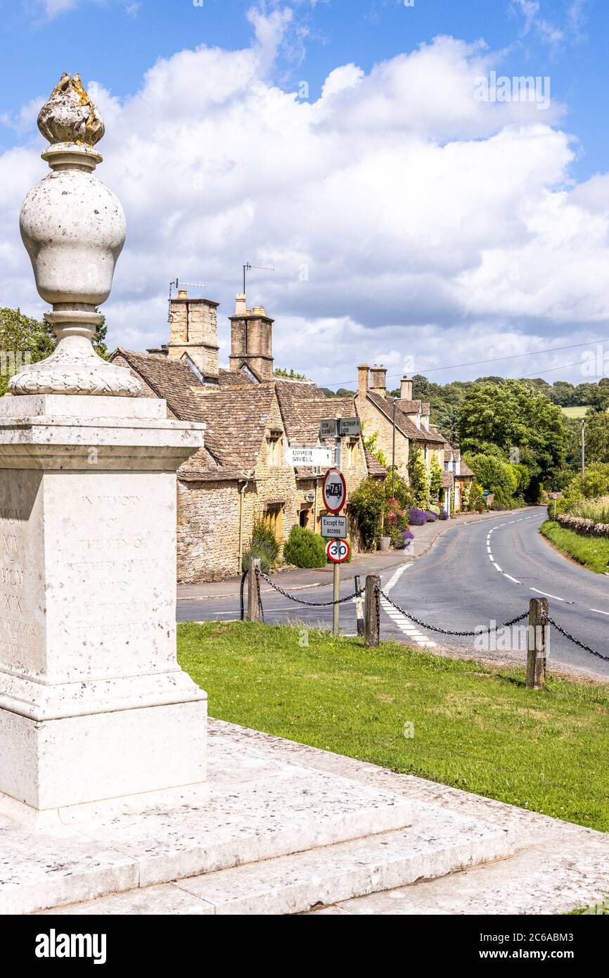 The Cotswold village of Lower Swell, Gloucestershire UK viewed from the war memorial on the village green. Stock Photo