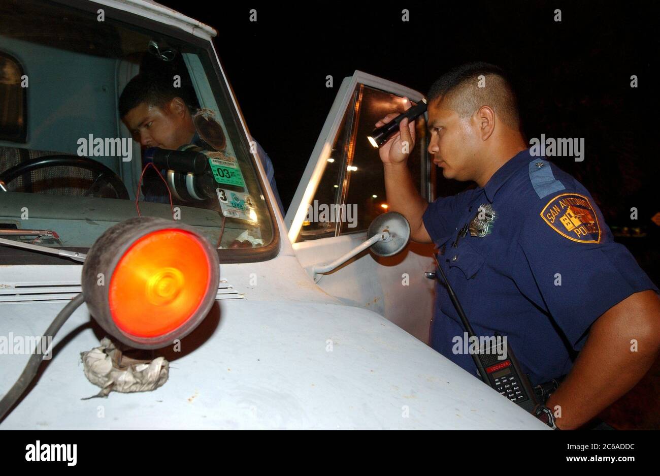 San Antonio, Texas USA, August 78, 2003 Police officers looking for