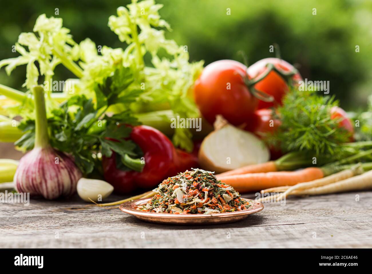 Plate with mix of vegetable condiment for soup Stock Photo - Alamy