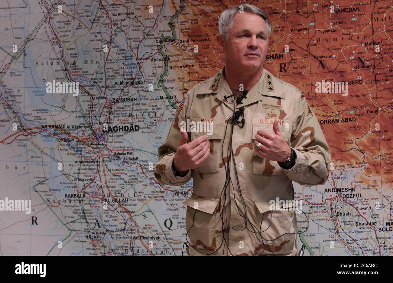 Fort Hood, TX  December 12, 2003:  Lt. Gen. Thomas Metz, commander of III Corps of Fort Hood, stands in front of a map of Iraq at the sprawling military base in central Texas.  Metz will take over this spring for Lt. Gen. Ricardo Sanchez the command of Army ground troops in Iraq when thousands of fresh soldiers replace weary U.S. ground troops in April.  ©Bob Daemmrich Stock Photo