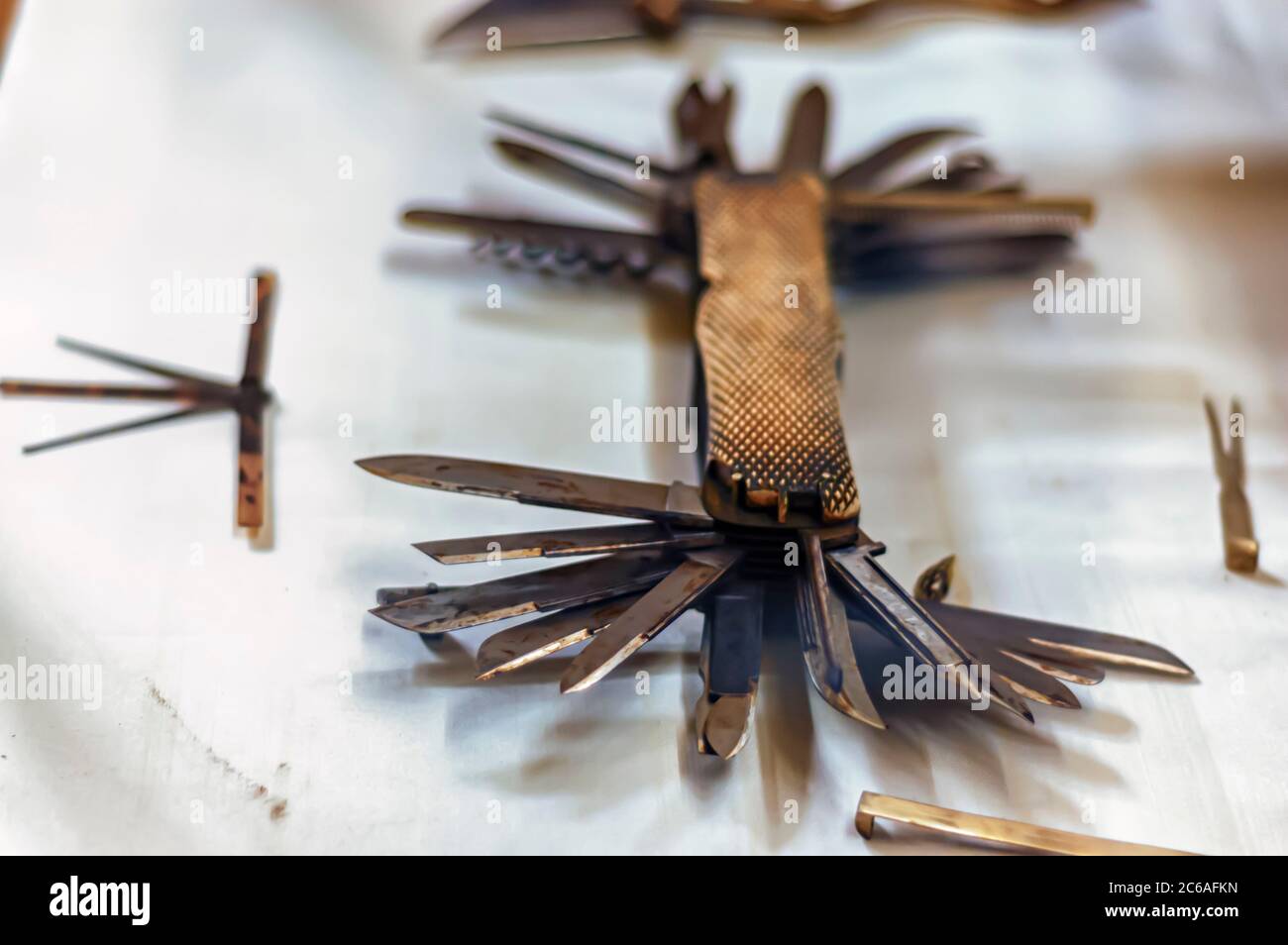 A rusted Swiss Army knife on display behind a glass cabinet at the Chowmahalla Palace, Hyderabad, Telangana, India. Stock Photo