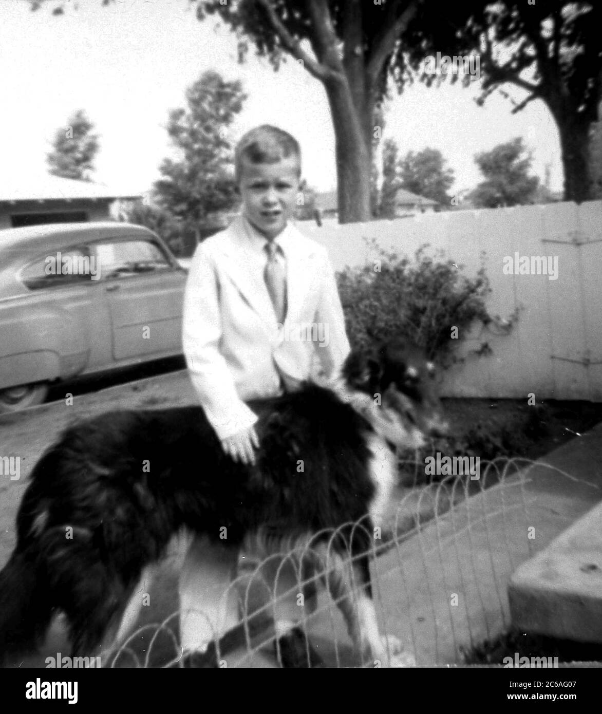 HS576  Seven-year-old George W. Bush with his dog in Midland, Texas USA, 11 February 1954. Photo credit: George Bush Presidential Library Stock Photo